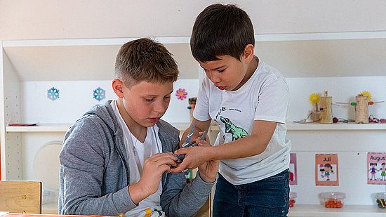 [Translate to English:] Boys Day im Minihaus München Kindergarten